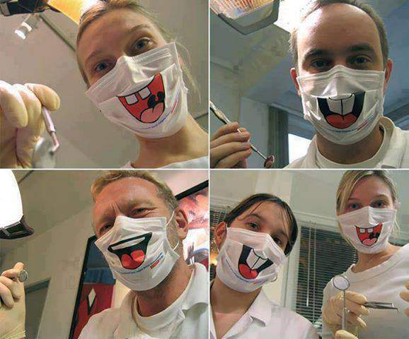 Surgical masks with funny cartoon mouth for dentists