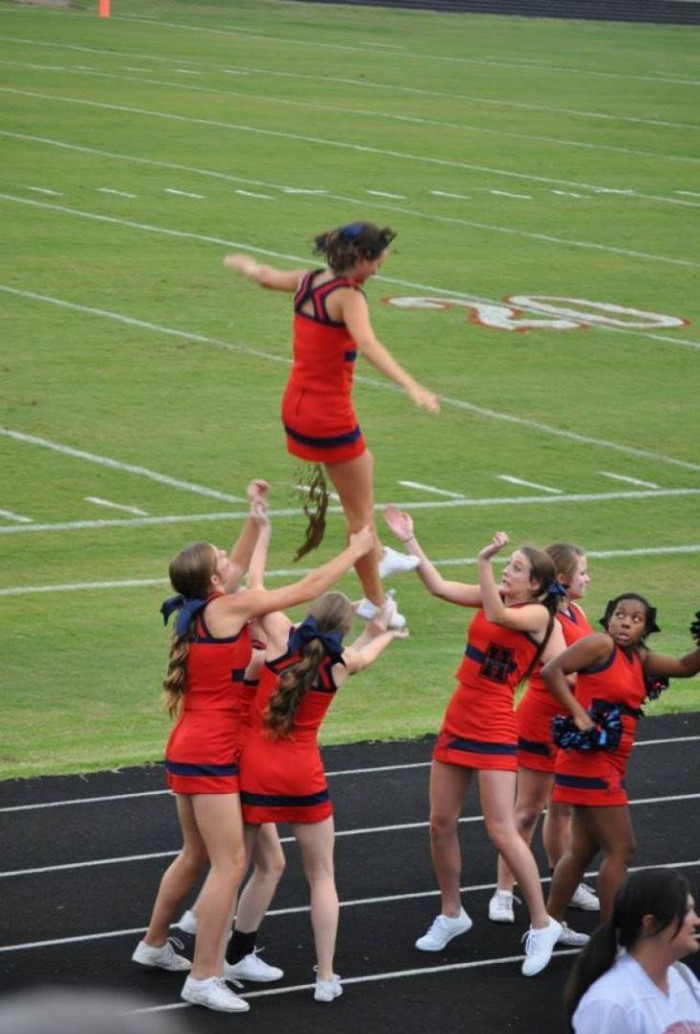 Cheerleader Takes Dump On Teammates In Mid-Air