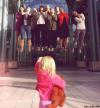 Little Girl Vadering Lots Of People