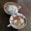 Making coffee becomes art. Cat catching fishes!
