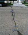 Taped crack in the road - This should do the trick !